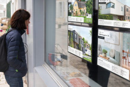 real-estate-agency-woman-with-backpack-looking