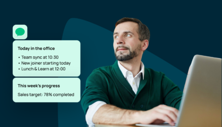 man on laptop looking at tv screens info