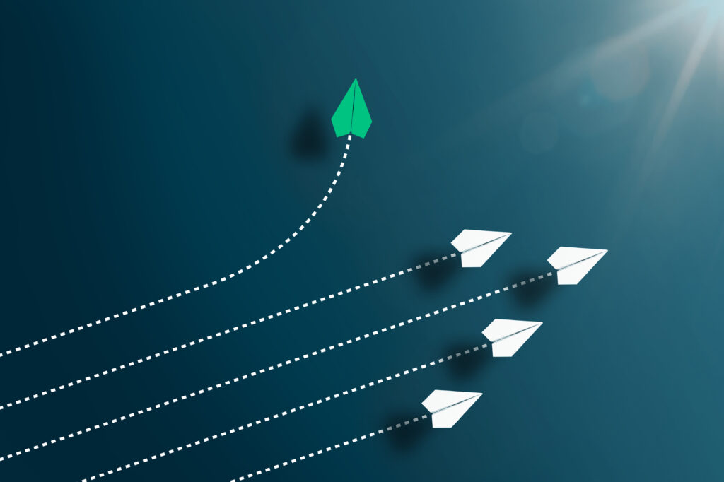 Abstract image of green and white paper planes